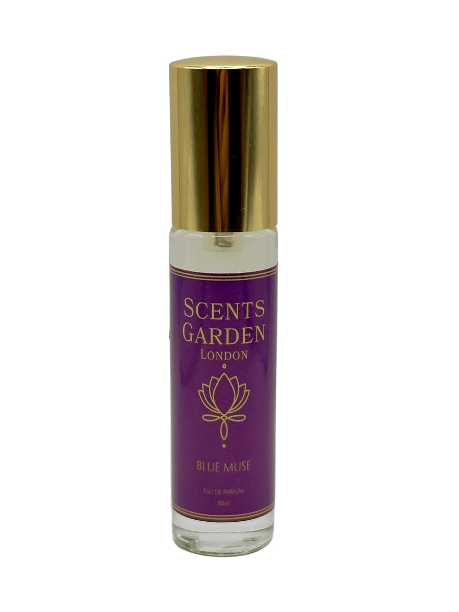 A bottle of Scents Garden Blue Muse Eau de Parfum spray perfume with a purple label and a black cap.